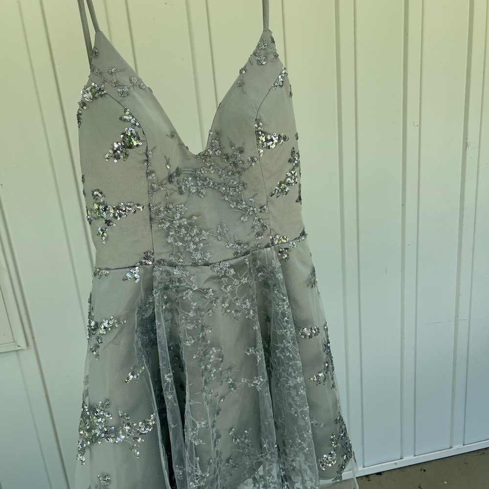 sequin cupcake style dress, spaghetti straps, short/mini, v-neck line